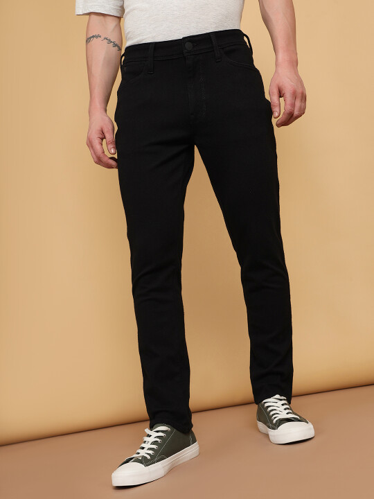 Buy Men Black Bostin Slim Fit Mid Rise No Fade Jeans | Wrangler® India  Official Online Store