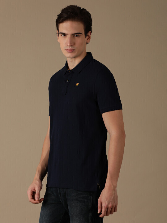 Buy Men Solid Blue Polo Neck Regular Fit Tshirt | Wrangler® India